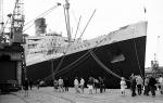 ID 1605 QUEEN MARY (26 SEPT 1934/80774grt/ON 528793) berthed alongside the Ocean Terminal in Southampton, England just three months before her final Atlantic crossing on 16 September 1967.